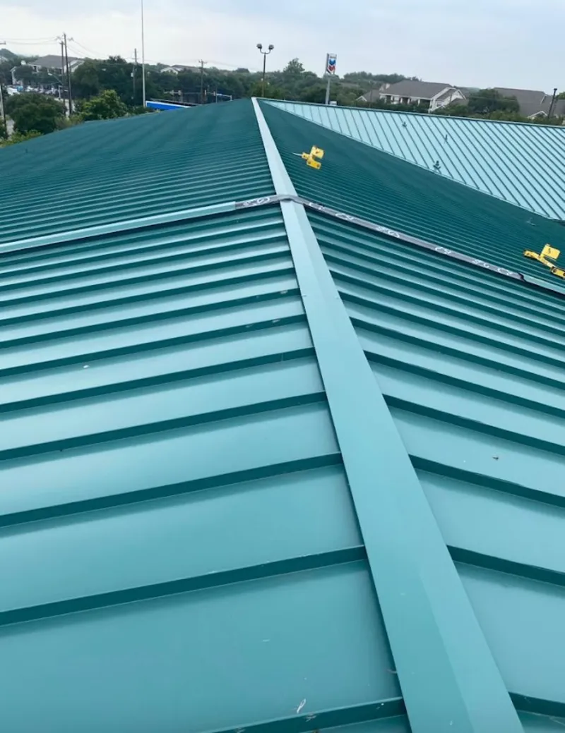 Green commercial metal roof ridge and valley for Metal Roof Repair in Ballston